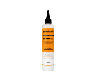 Nomakade shampoo bottle on a white background