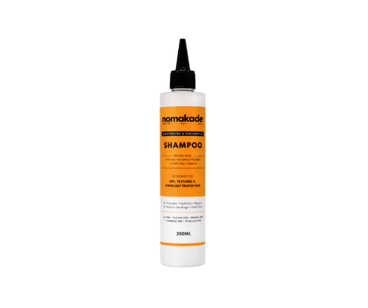 Nomakade shampoo bottle on a white background